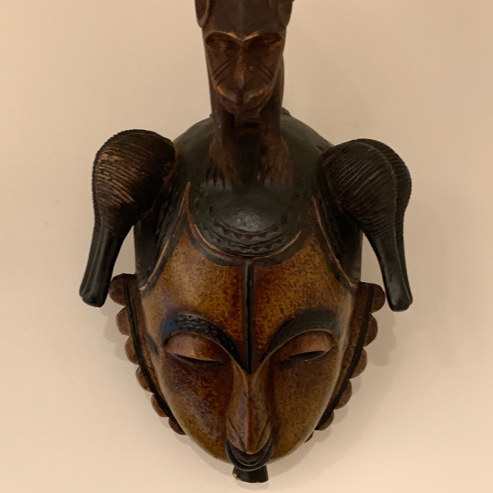 Ancient face with Monkey